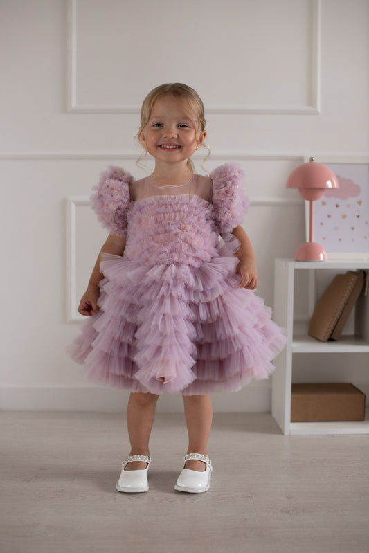 Robe cérémonie enfant bois de rose avec jupe volumineuse à volants et manches décoratives pompon
