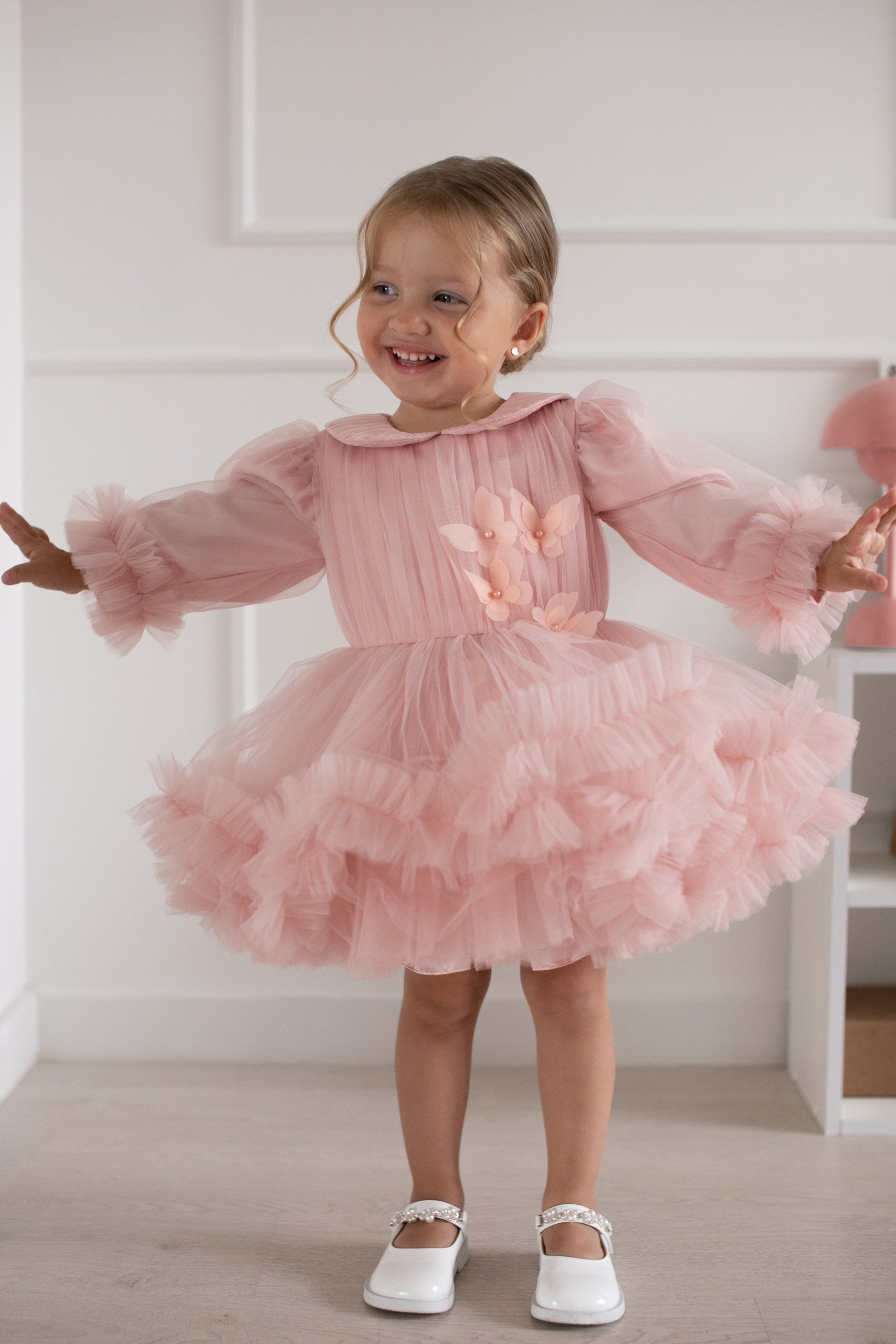 Robe cérémonie enfant en tulle avec effet froufrou, manches bouffantes et superposition de volants